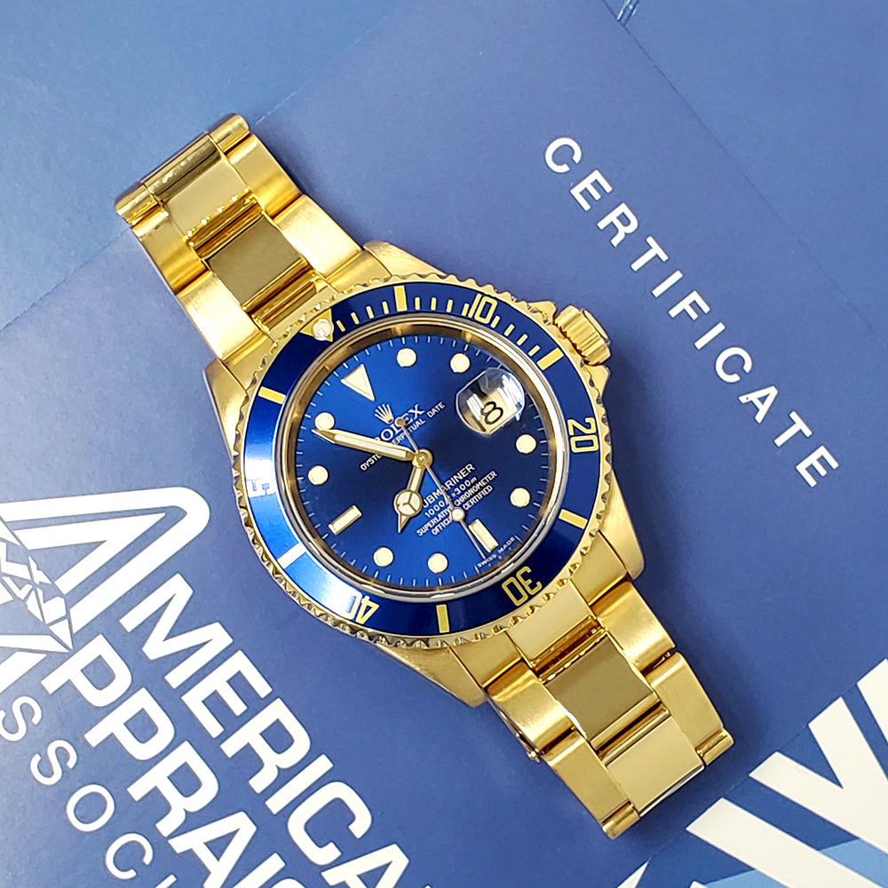 2005 Rolex Submariner Date 16618T 18K Yellow Gold Blue Dial 40mm