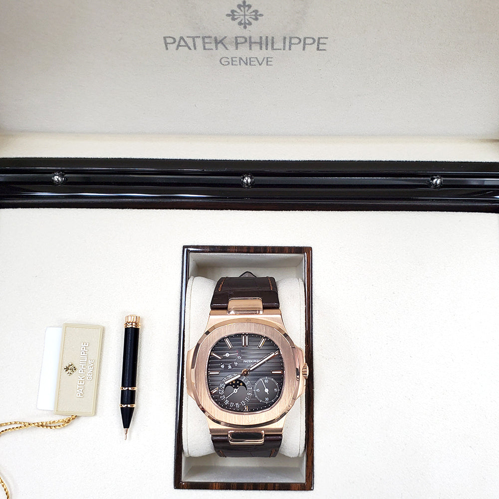 Patek Philippe Nautilus 40mm Rose Gold Watch 5712R-001 Box Papers