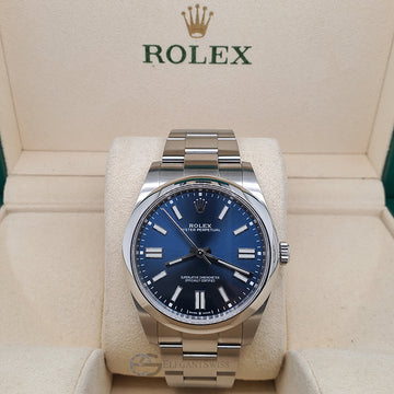 Rolex Oyster Perpetual 41mm Bright Blue Dial Stainless Steel Watch 124300 Box Papers